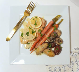 Overhead view of One Pan Chicken and Roast Veggies on a plate