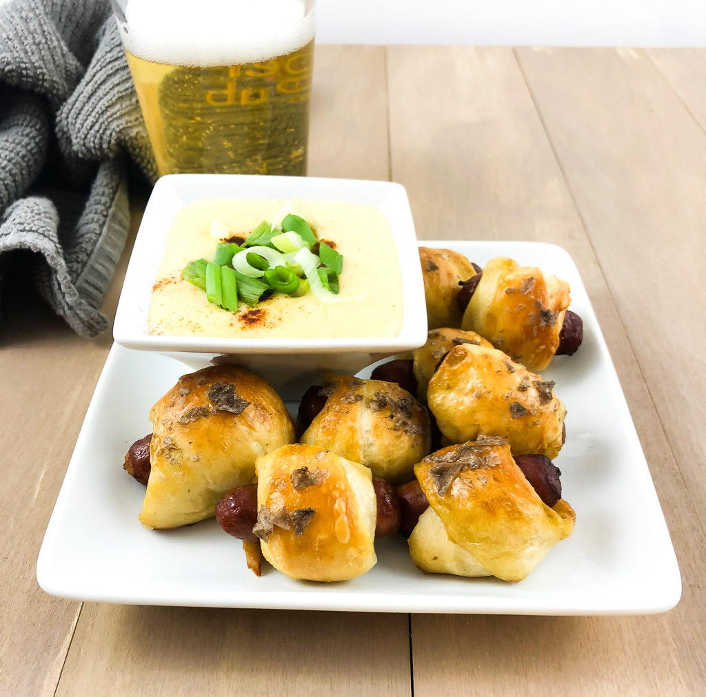 Pretzel Dogs with Beer Cheese Dip served with a beer