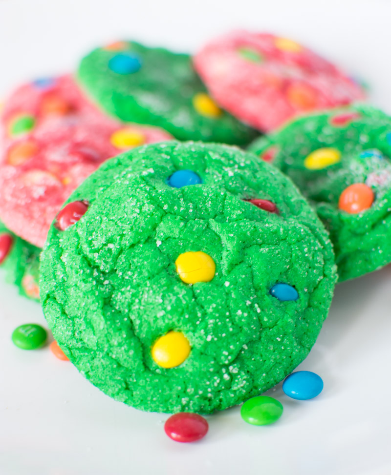 Close up of green cookie on a pile of cookies
