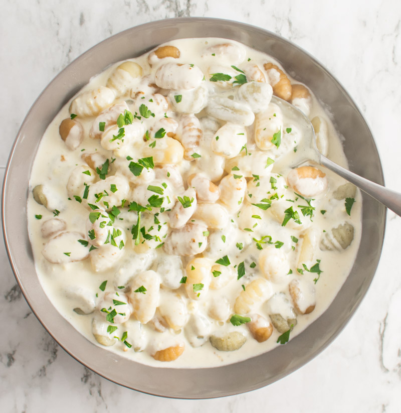 Overhead picture of Gnocchi with Gorgonzola Cream Sauce in a large bowl