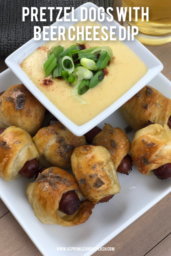 Closeup of Pretzel Dogs on a plate with Beer Cheese Dip in a bowl topped with green onions Pin Image