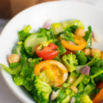 Rainbow Mediterranean Salad in white bowl