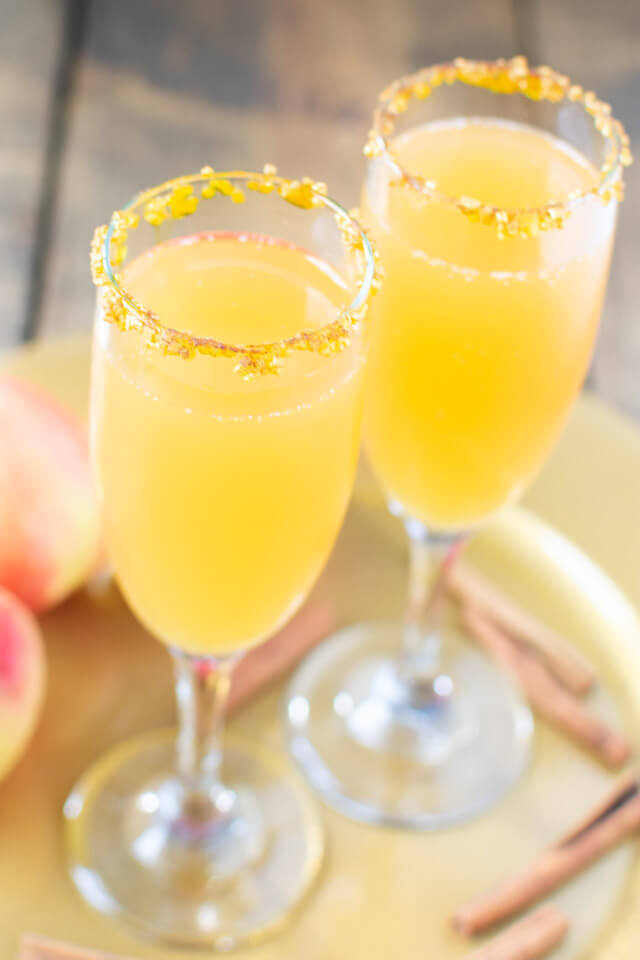 Closeup view of two apple cider mimosas