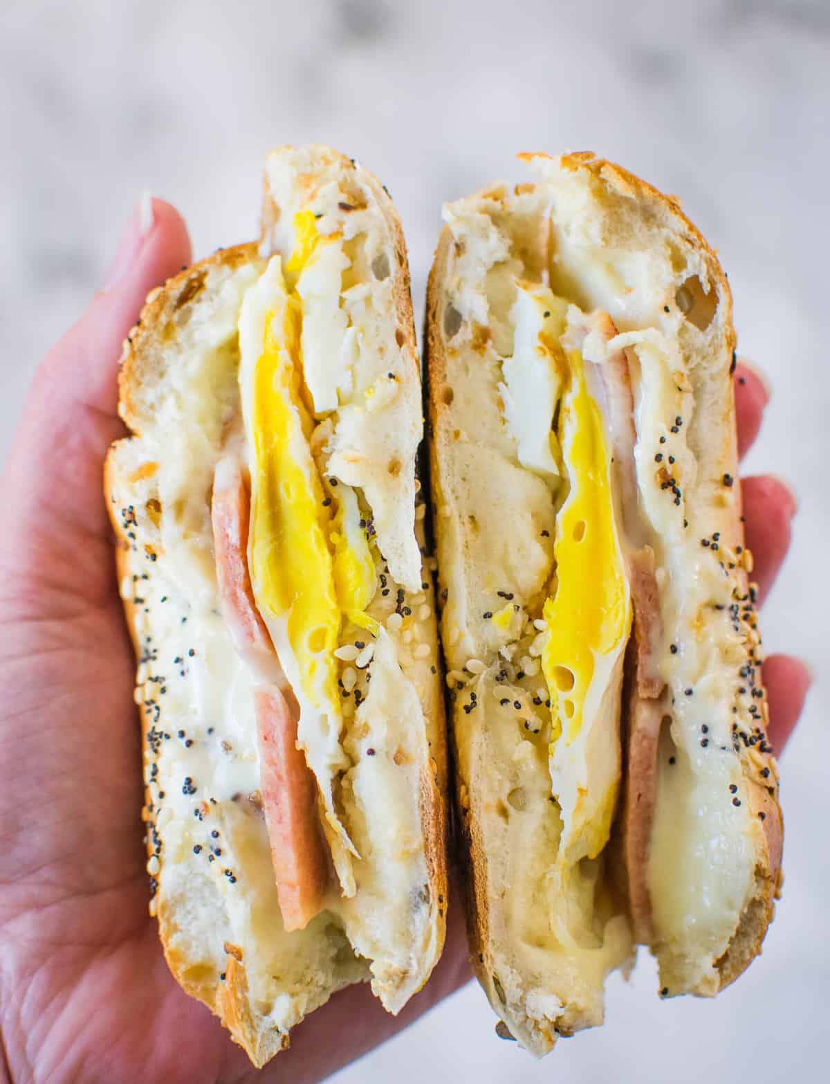 bagel breakfast sandwich cut in half