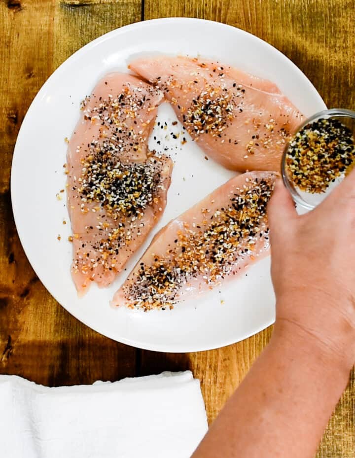coating chicken breasts with everything but the bagel seasoning