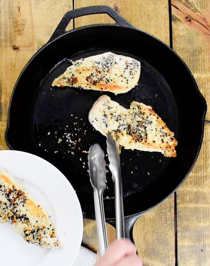 removing browned chicken breasts from skillet
