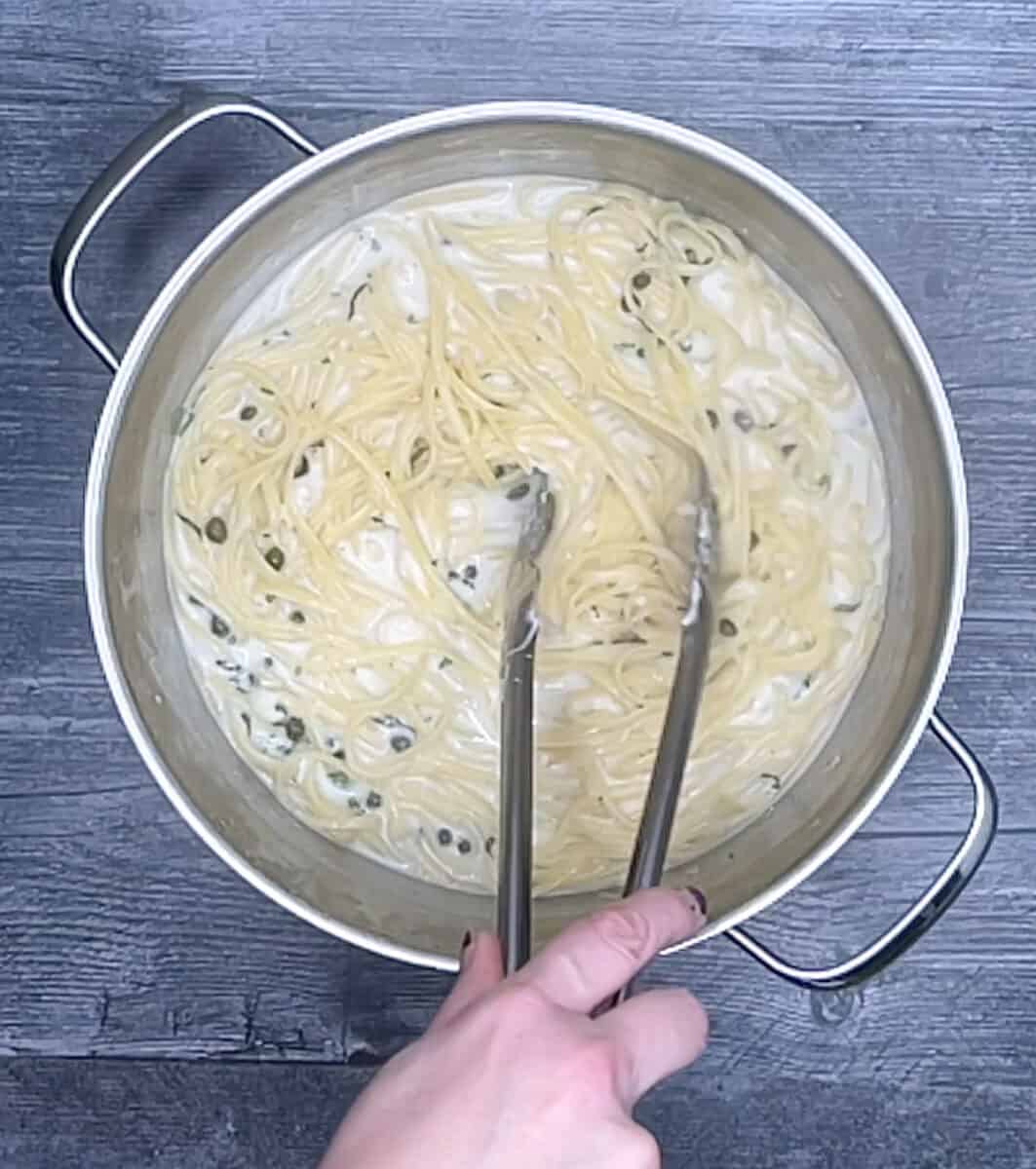 stirring pasta ingredients in one pot until liquid is absorbed