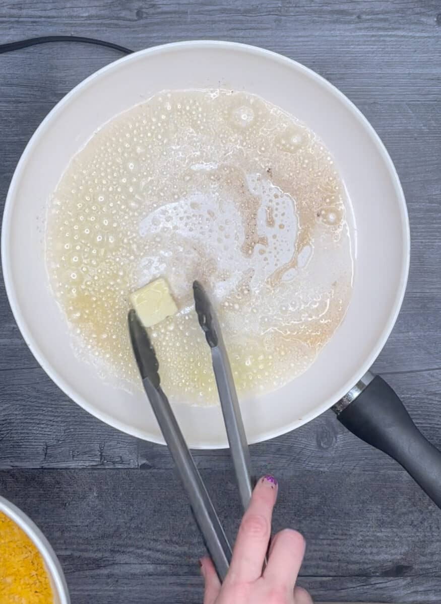 melting butter and oil together in a skillet over medium heat