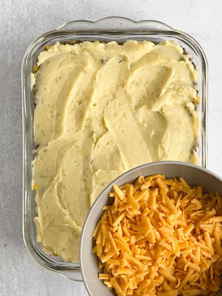 step 12 top potatoes with cheddar cheese