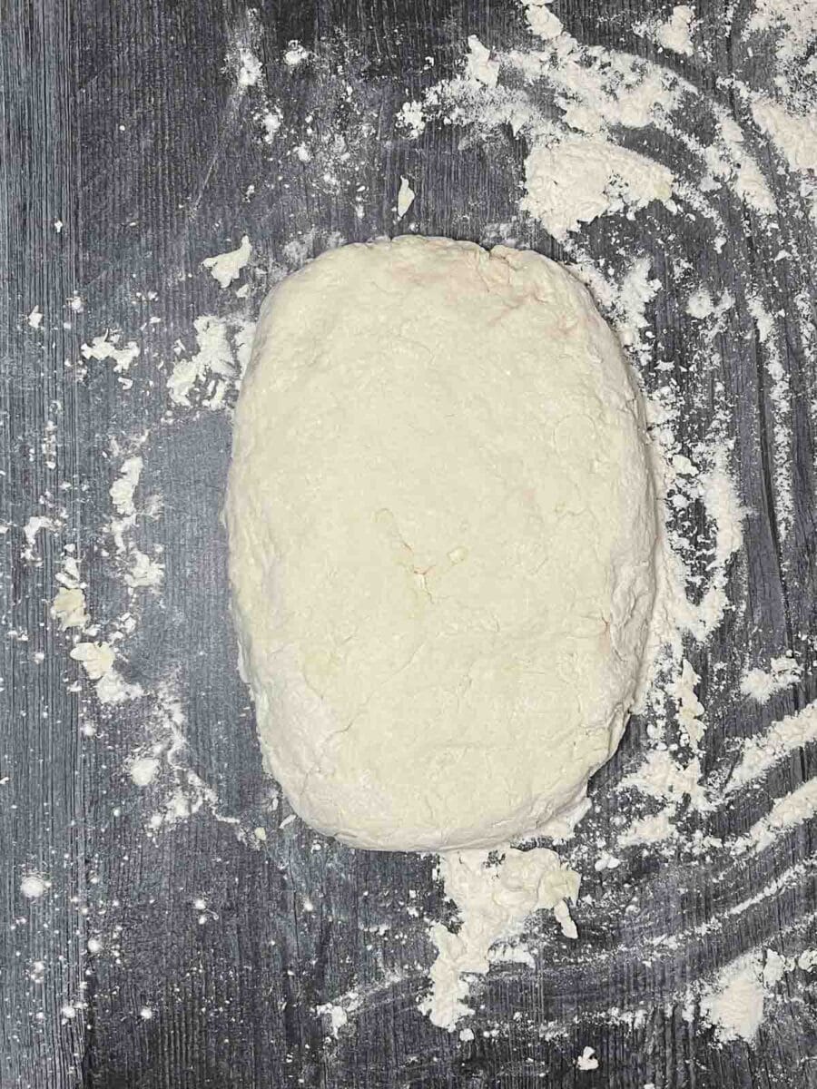 cottage cheese bagel dough formed into a large rectangle