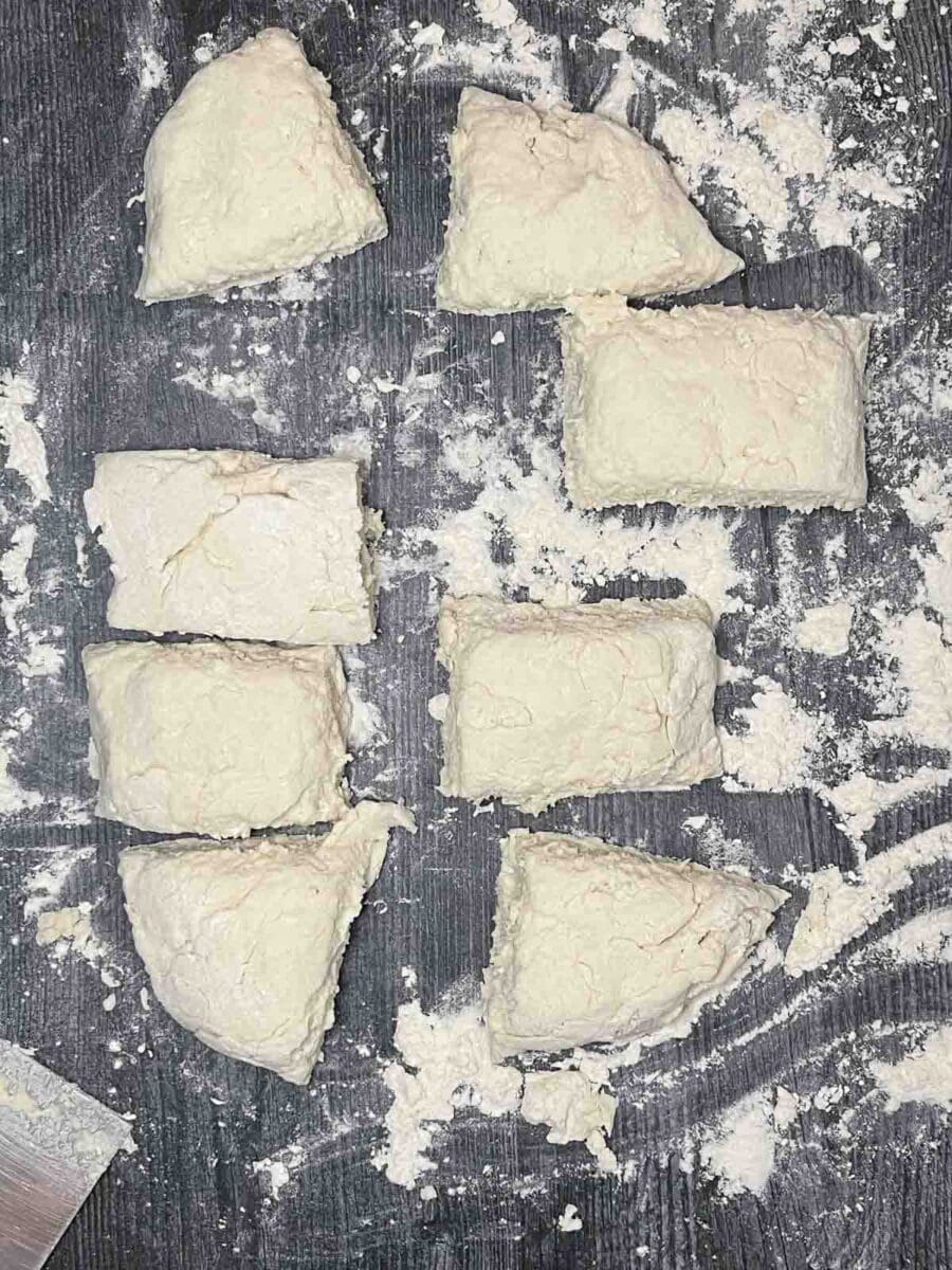 cottage cheese bagel dough cut into pieces ready to be formed