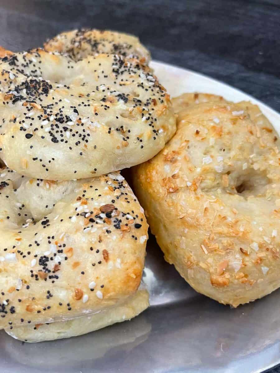 Closeup view of baked bagels on a plate