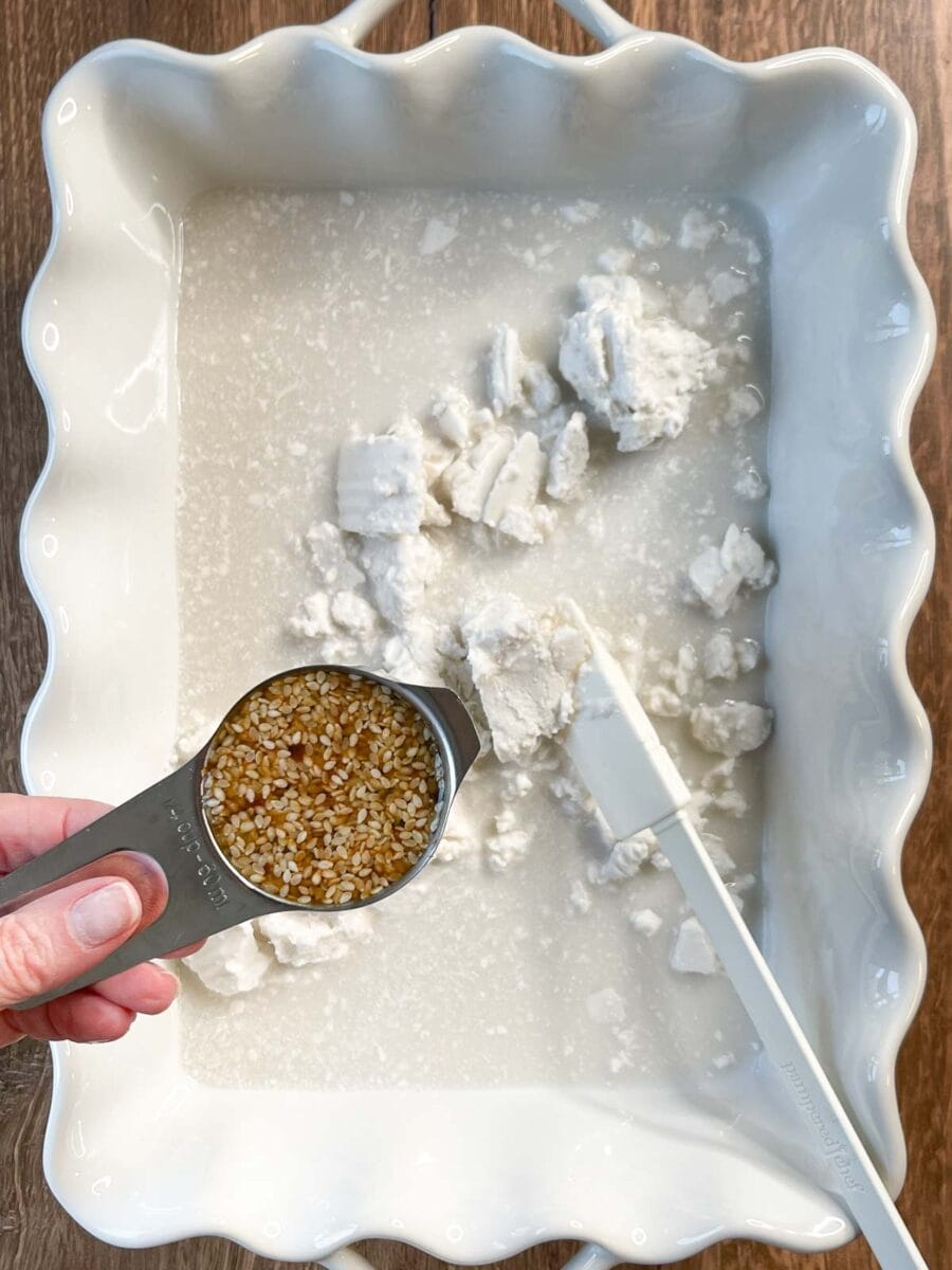 about to add soyaki sauce to white dish