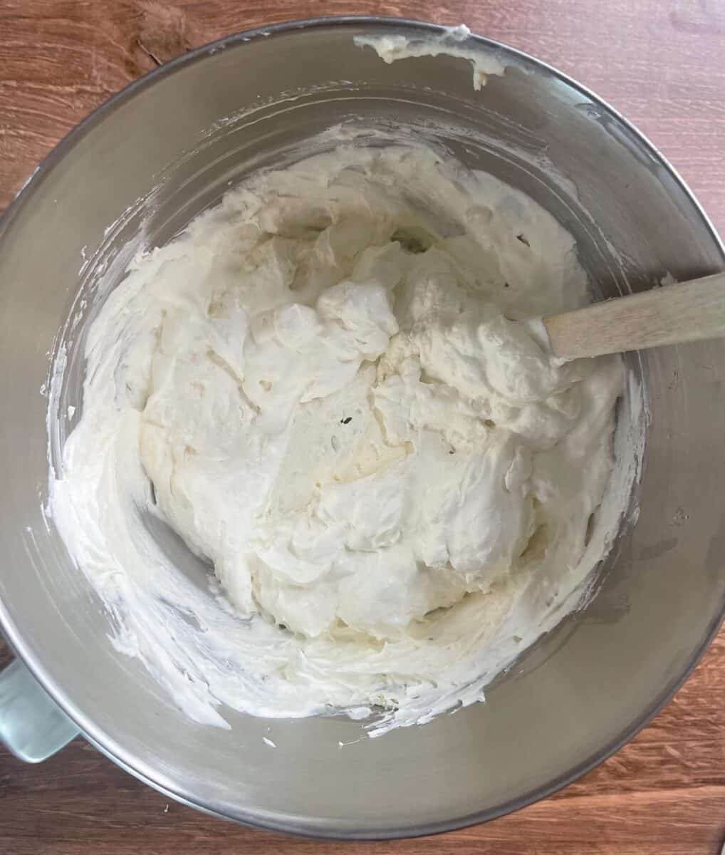 cake dip is blended in mixing bowl with whipped topping